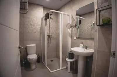 Un baño de Apartamentos Turísticos Capitán Orellana