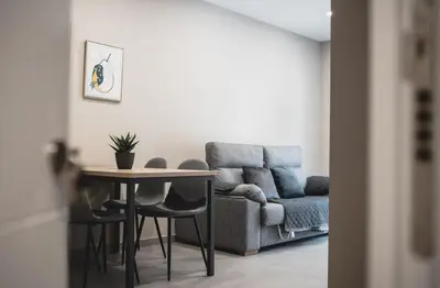 Zona de estar de Apartamentos Turísticos Capitán Orellana