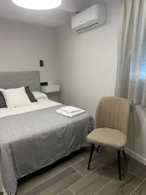 Cama o camas de una habitación en Apartamentos Turísticos AIRES DE LA VERA