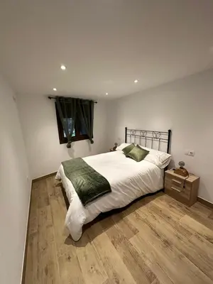 Cama o camas de una habitación en Apartamentos Rurales La Estrella