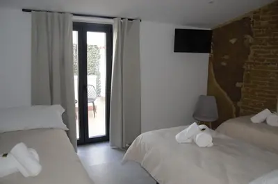 Cama o camas de una habitación en Sueños del Geoparque