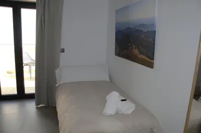 Cama o camas de una habitación en Sueños del Geoparque