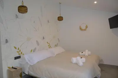 Cama o camas de una habitación en Sueños del Geoparque
