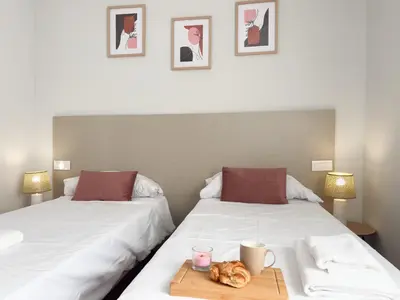 Cama o camas de una habitación en TAYP OrigenHomes
