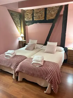 Cama o camas de una habitación en La Carbonería