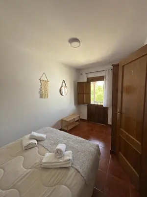 Cama o camas de una habitación en La Casina Del Mercao