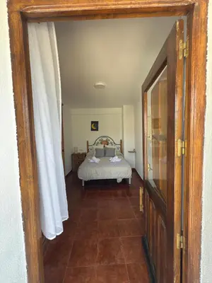Cama o camas de una habitación en La Casina Del Mercao