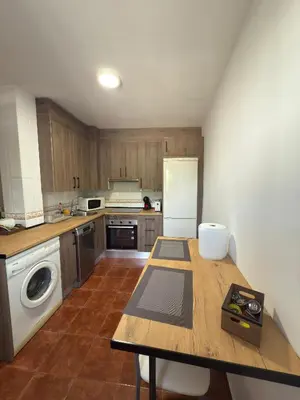 Una cocina o zona de cocina en La Casina Del Mercao