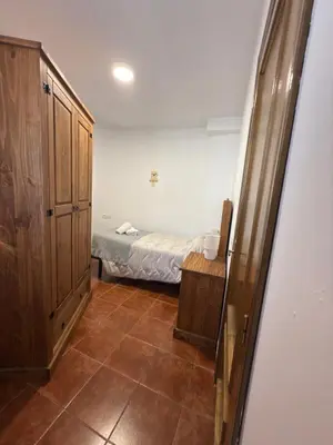 Cama o camas de una habitación en La Casina Del Mercao