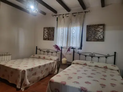 Cama o camas de una habitación en Casa Rural Amaneceres