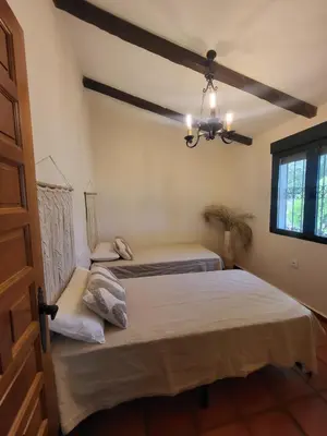 Cama o camas de una habitación en Casa Rural Amaneceres