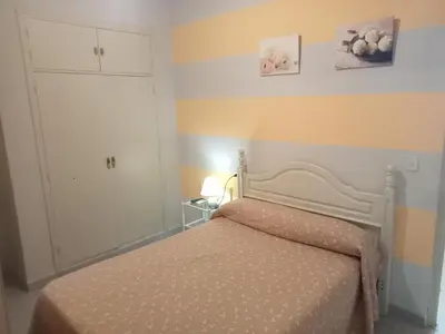 Cama o camas de una habitación en Hostal Trujillo
