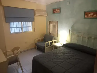Cama o camas de una habitación en Hostal Trujillo