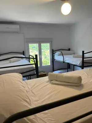 Cama o camas de una habitación en Albergue La Parra