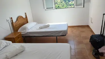 Cama o camas de una habitación en Albergue La Parra