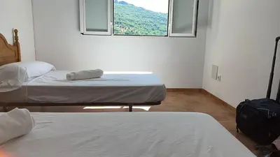 Cama o camas de una habitación en Albergue La Parra