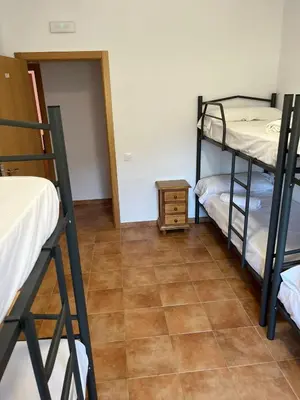 Cama o camas de una habitación en Albergue La Parra