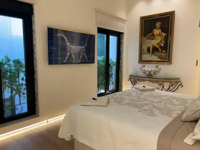 Cama o camas de una habitación en El Balcón del Mercado Chico