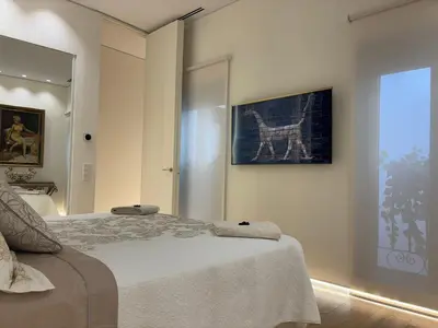 Cama o camas de una habitación en El Balcón del Mercado Chico