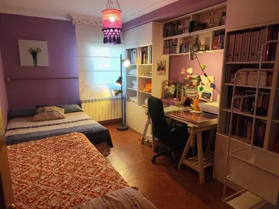 Cama o camas de una habitación en Acogedora casa con jardín