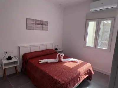 Cama o camas de una habitación en Apartamento Rosina Ávila Center