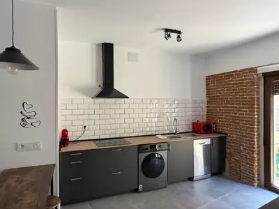 Una cocina o zona de cocina en Apartamento Rosina Ávila Center