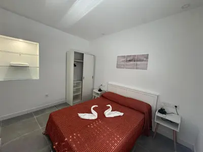 Cama o camas de una habitación en Apartamento Rosina Ávila Center