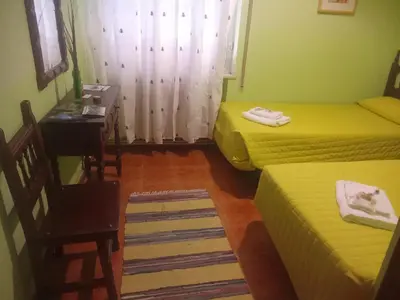 Cama o camas de una habitación en Hostal casa Hinojosa