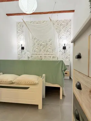Cama o camas de una habitación en El Boulevard de Trujillo 1895