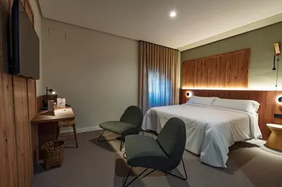 Cama o camas de una habitación en Hotel Valle del Ambroz