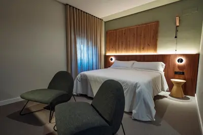 Cama o camas de una habitación en Hotel Valle del Ambroz