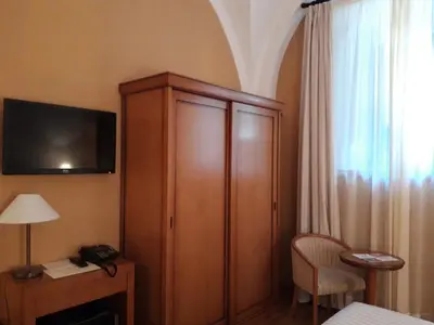 Cama o camas de una habitación en Hotel Ahc Palacio Coria