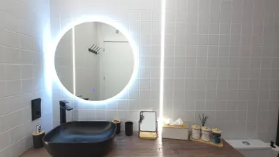 Un baño de Suites Oeste
