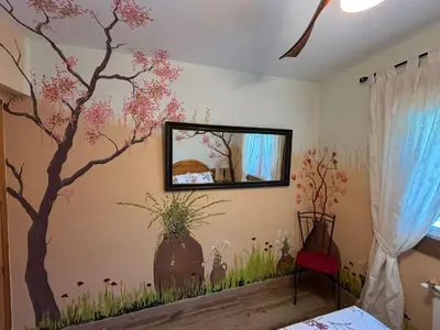 Una televisión o centro de entretenimiento en Casa Rural El Fresno