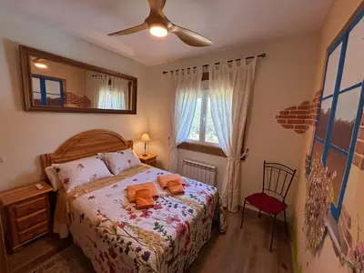 Cama o camas de una habitación en Casa Rural El Fresno