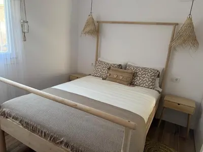 Cama o camas de una habitación en Apartamentos turisticos AMITIÉ 7 Centro