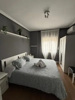 Cama o camas de una habitación en Apartamento a la Vera del Valle