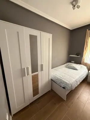 Cama o camas de una habitación en Apartamento a la Vera del Valle