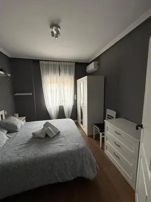 Cama o camas de una habitación en Apartamento a la Vera del Valle