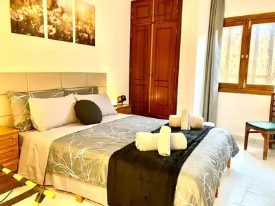 Cama o camas de una habitación en Casa Rural Los nietos de Pura