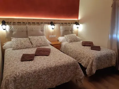 Cama o camas de una habitación en Casa Rural El Morisco