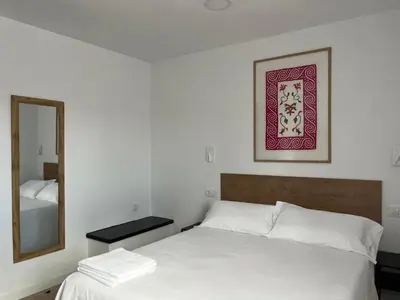 Cama o camas de una habitación en Tres Olivos