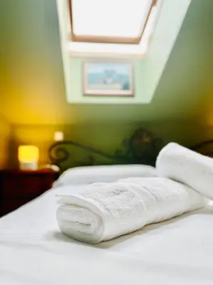 Cama o camas de una habitación en La Leyenda de Candeleda