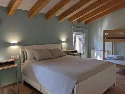 Cama o camas de una habitación en Alojamientos de turismo rural LA ESMERALDA