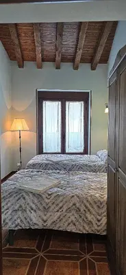 Cama o camas de una habitación en Casa Rural Antonio