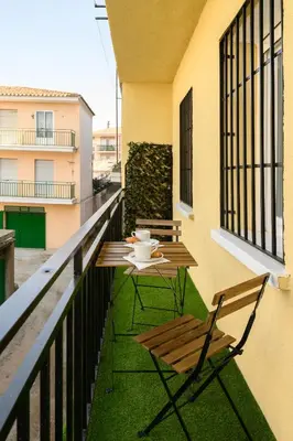Un balcón o terraza de APT-Inside the Wall-Family,Games,Relax,History