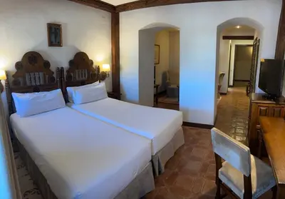 Cama o camas de una habitación en Parador de Plasencia