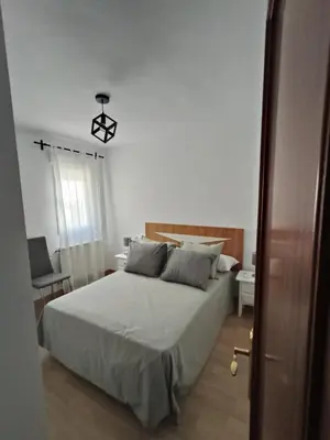 Cama o camas de una habitación en La Guinda del Jerte Apartamento Turistico