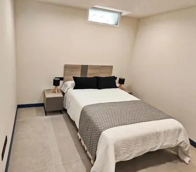 Cama o camas de una habitación en Vivienda Unifamiliar Ventana a la Clerecía