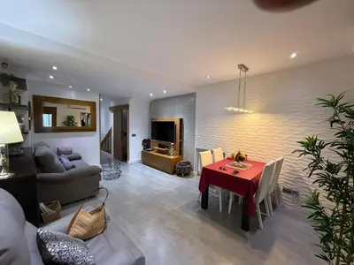 Una televisión o centro de entretenimiento en Apartamentos Nacho